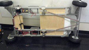 RoachKart is turned on its side to allow access for wiring.